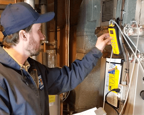Techs installing an AC unit